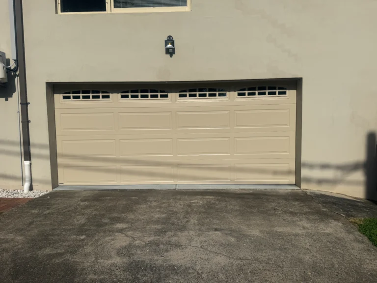 paperbark hampton smooth sectional door with cascade double windows