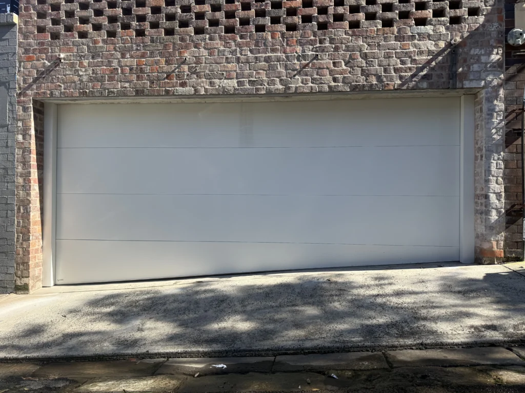 Surfmist flat smooth panel lift doors with Posts and taper