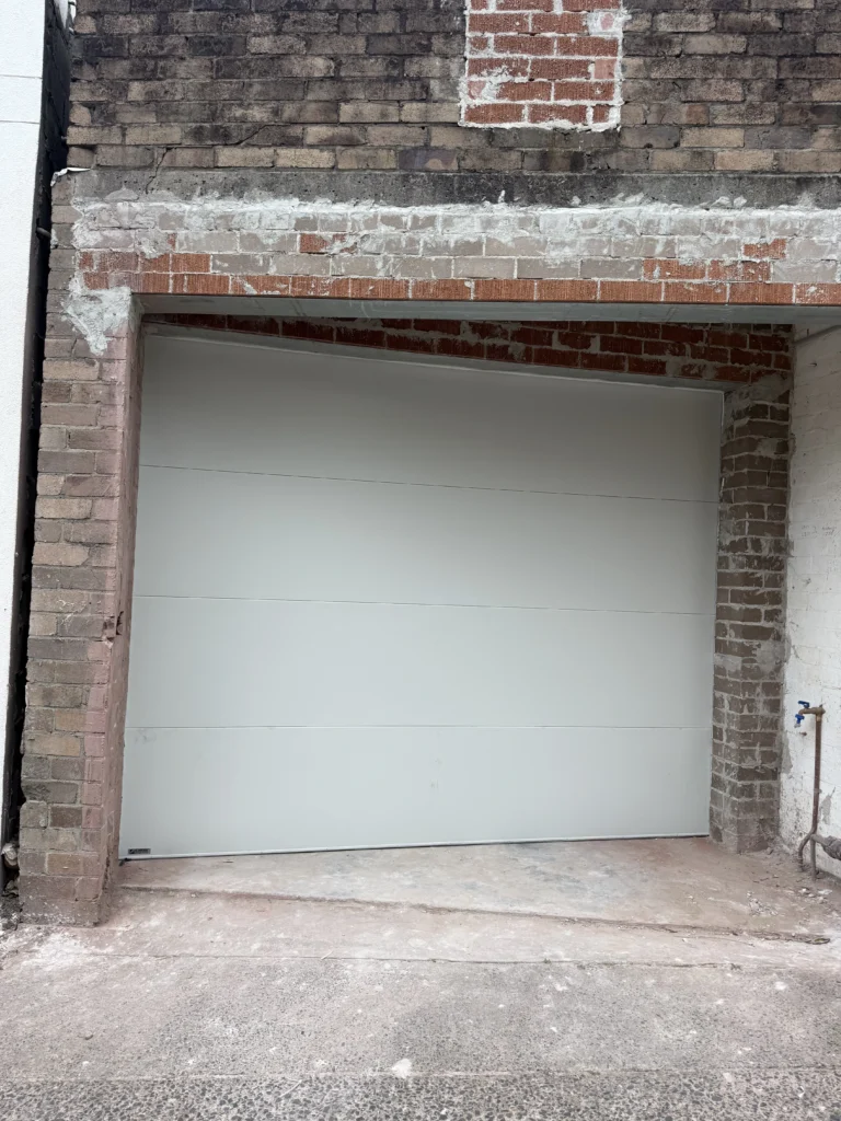 Surfmist Madison Smooth sectional door with Taper