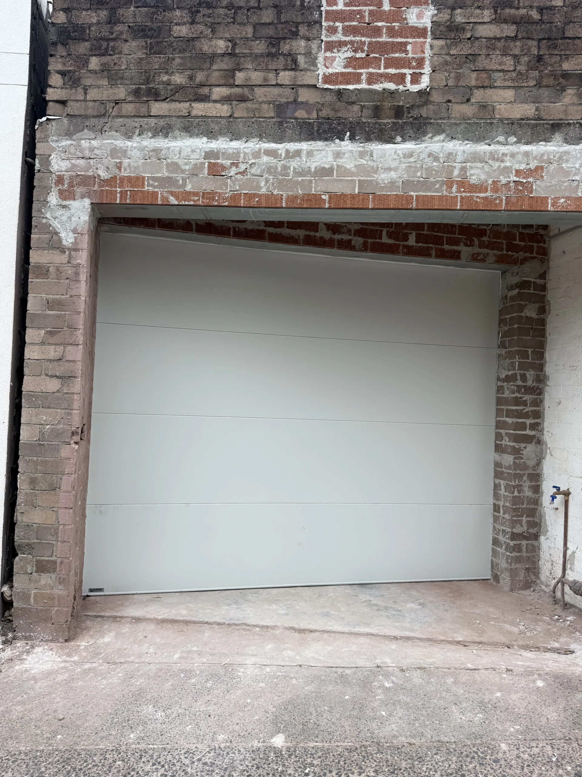 Surfmist Madison Smooth sectional door with Taper