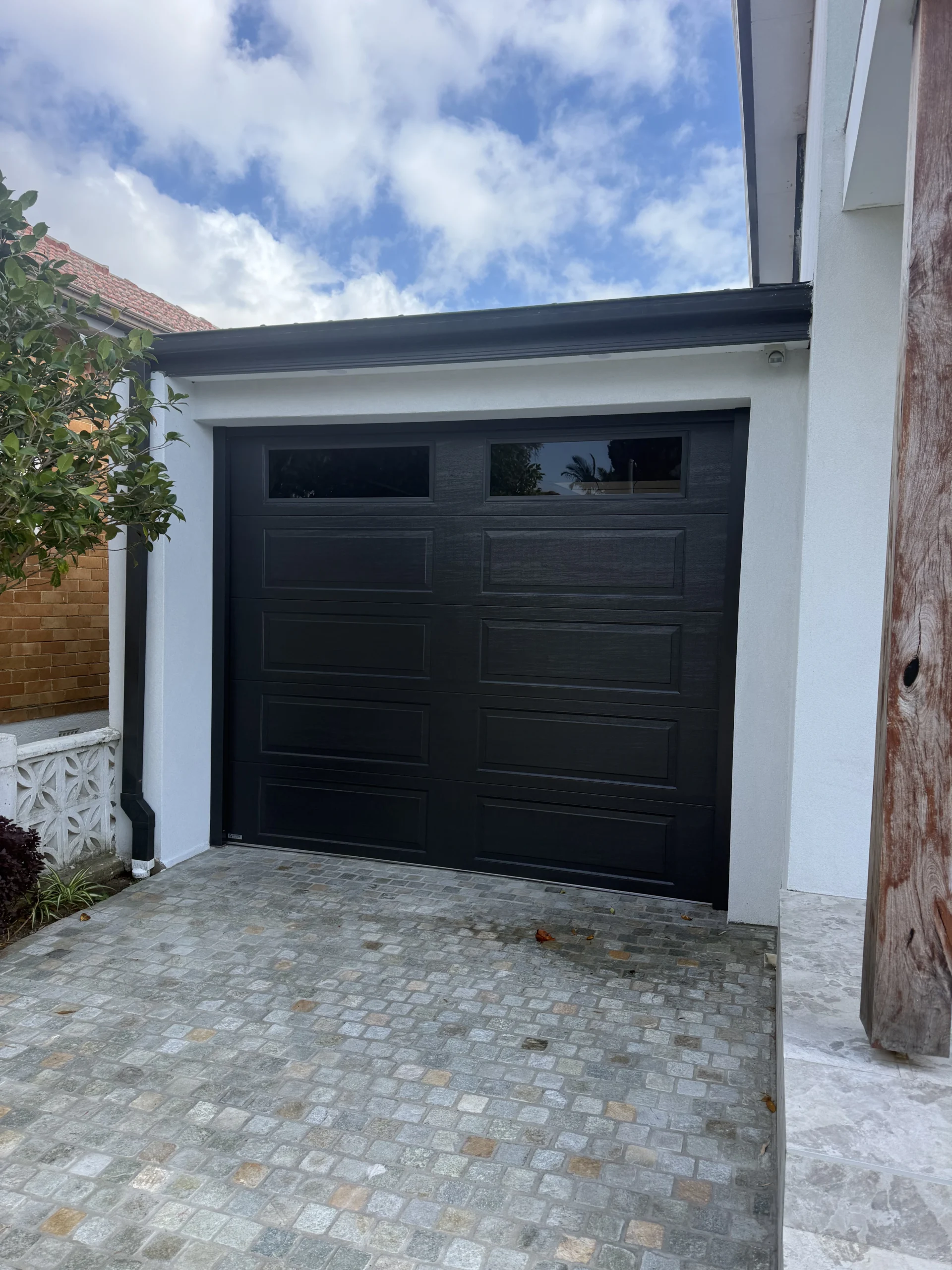 Monument Hamption Woodgrain Panel lift with traditonal windows