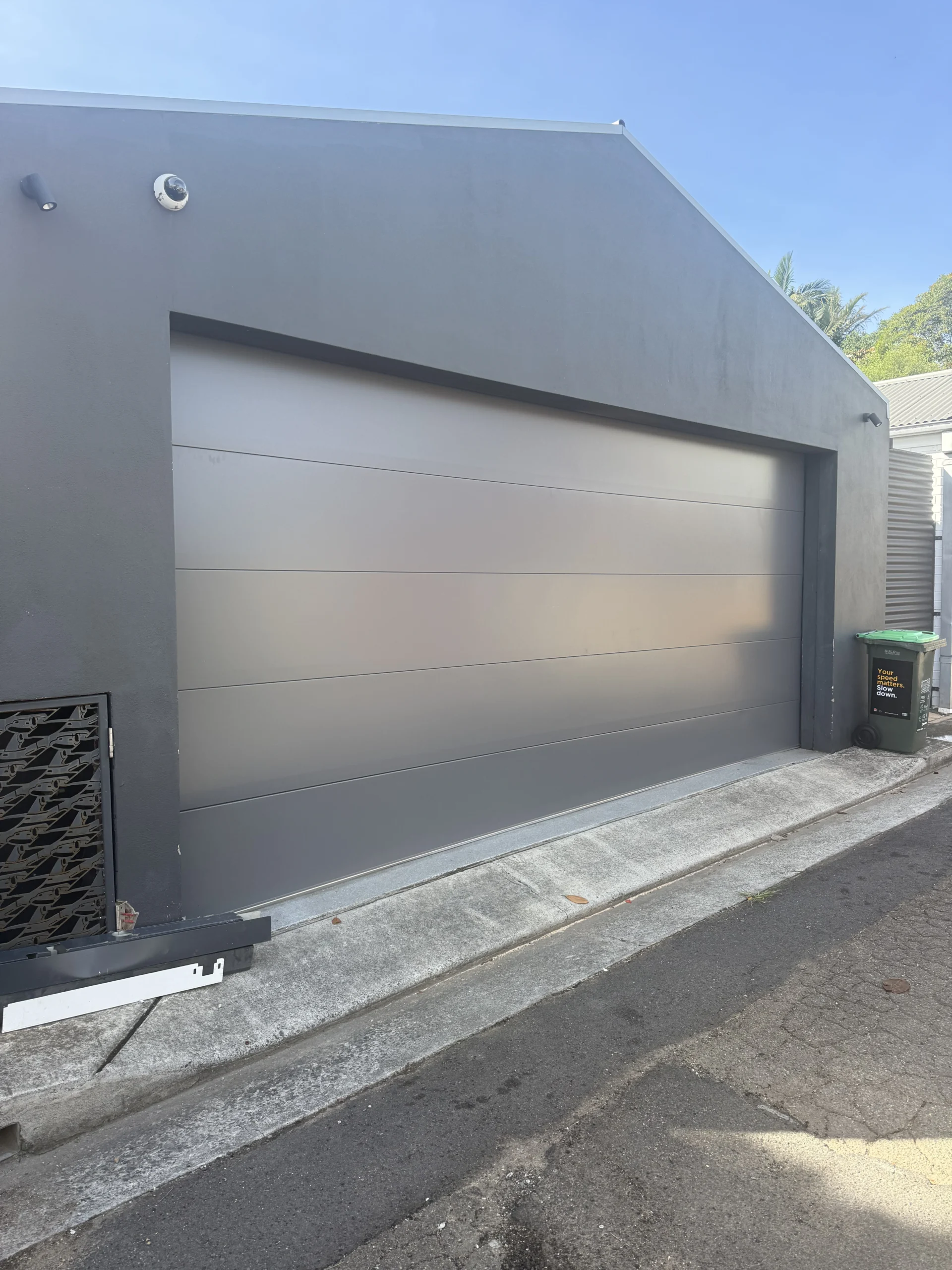 Basalt Madison Smooth Sectional Door with Taper